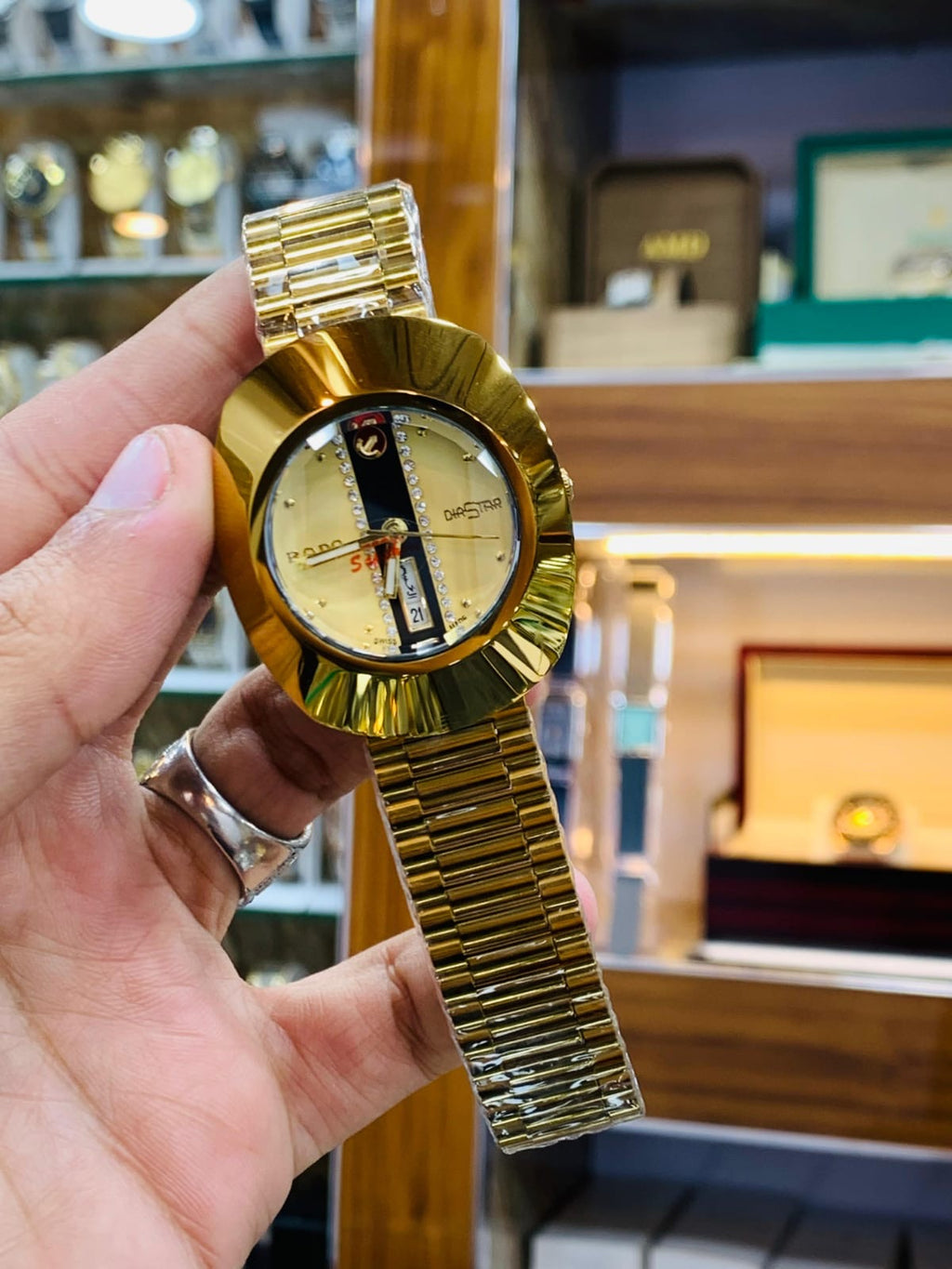 Rado DiaStar featuring a distinct oval case and a checkered dial pattern