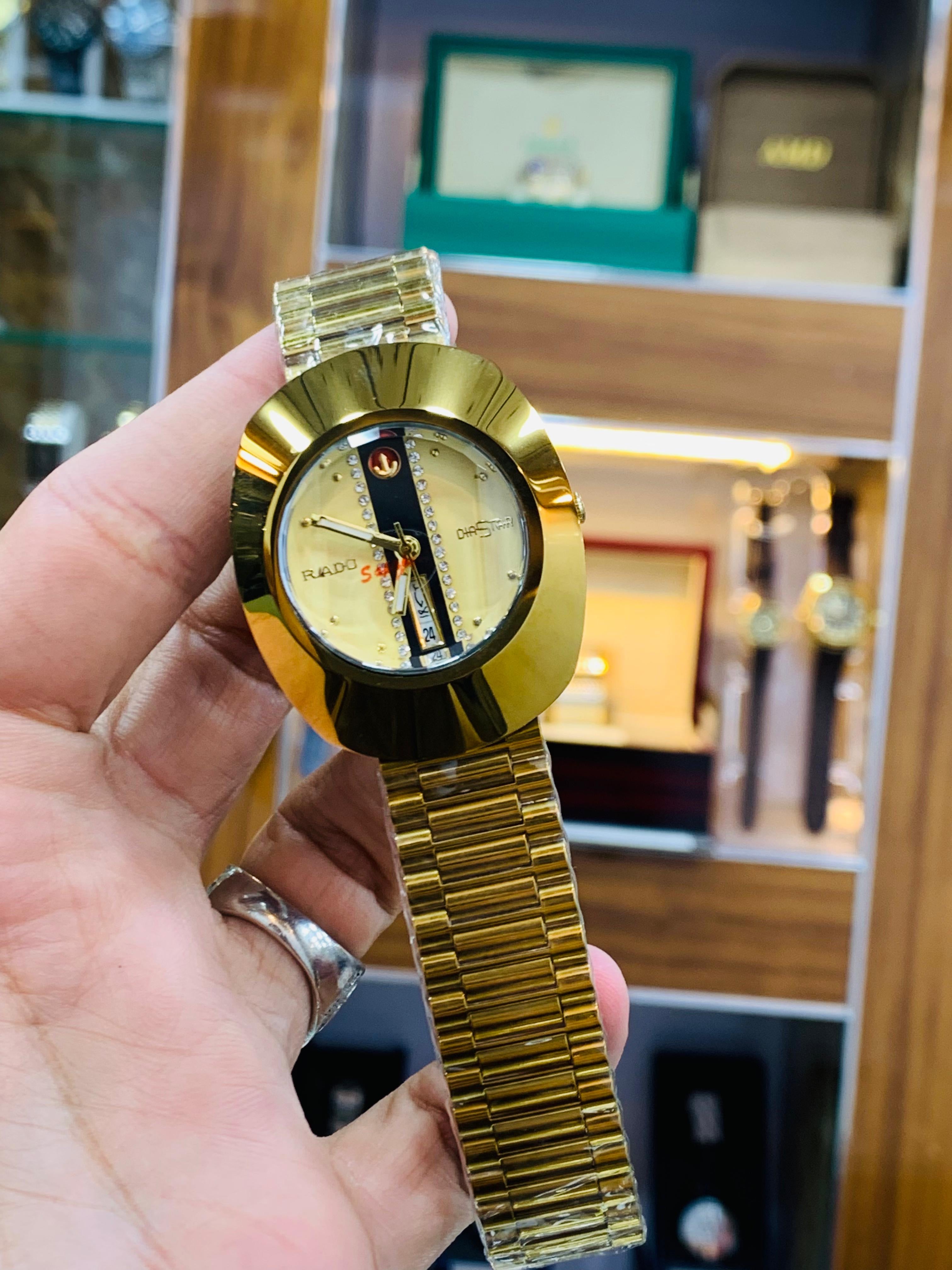 Rado DiaStar featuring a distinct oval case and a checkered dial pattern